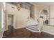 Bright entryway with staircase and hardwood floors at 1663 S Boulder St, Gilbert, AZ 85295