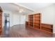 Bright bedroom with wood flooring, double doors, and built-in shelving at 1663 S Boulder St, Gilbert, AZ 85295
