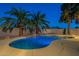 Relaxing pool area with palm trees at 1663 S Boulder St, Gilbert, AZ 85295