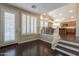 Bright entryway with wood floors and view to kitchen at 1663 S Boulder St, Gilbert, AZ 85295