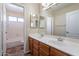 Bathroom boasts double sinks and a shower/tub combo at 1663 S Boulder St, Gilbert, AZ 85295