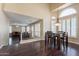 Open dining area with wood floors and access to living room at 1663 S Boulder St, Gilbert, AZ 85295