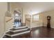 Elegant staircase with white risers and dark wood railing at 1663 S Boulder St, Gilbert, AZ 85295