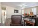 Relaxing living room with comfy seating and dark hardwood floors at 1663 S Boulder St, Gilbert, AZ 85295