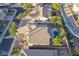 Aerial view showcasing a house with a pool in a residential area at 1663 S Boulder St, Gilbert, AZ 85295