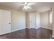 Spacious bedroom with ceiling fan and wood flooring at 1663 S Boulder St, Gilbert, AZ 85295