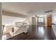 Spacious loft area with wood flooring, ceiling fan, and open railing at 1663 S Boulder St, Gilbert, AZ 85295