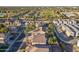 Aerial view of a house near a golf course and other homes at 1663 S Boulder St, Gilbert, AZ 85295