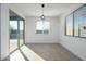 Dining area with sliding glass doors and window coverings at 735 E Marblewood Way, Phoenix, AZ 85048