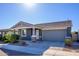 New construction home with gray exterior and two-car garage at 735 E Marblewood Way, Phoenix, AZ 85048