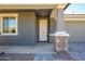Front entrance with stone accents and covered porch at 735 E Marblewood Way, Phoenix, AZ 85048