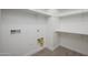 Laundry room with built-in shelving and tile flooring at 735 E Marblewood Way, Phoenix, AZ 85048