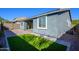 Home exterior showcasing backyard and patio at 735 E Marblewood Way, Phoenix, AZ 85048