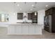 Modern kitchen with dark cabinets and granite island at 735 E Marblewood Way, Phoenix, AZ 85048