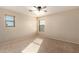 Bright bedroom with carpet and ceiling fan at 25575 W Lynne Ln, Buckeye, AZ 85326
