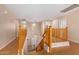 Elegant wooden staircase connecting the floors of this two-story home at 25575 W Lynne Ln, Buckeye, AZ 85326