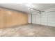 Spacious garage with ample storage cabinets and overhead lighting at 25575 W Lynne Ln, Buckeye, AZ 85326