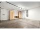 Clean and organized garage with built-in storage at 25575 W Lynne Ln, Buckeye, AZ 85326