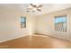 Bedroom with wood flooring and ceiling fan at 25575 W Lynne Ln, Buckeye, AZ 85326