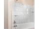 Bathroom with marble tile shower and tub at 25575 W Lynne Ln, Buckeye, AZ 85326