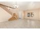 Spacious entryway with tiled floors and staircase at 25575 W Lynne Ln, Buckeye, AZ 85326
