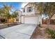 Two story house with attached garage and landscaping at 25575 W Lynne Ln, Buckeye, AZ 85326