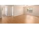 Bedroom with wood-look floors, and access to bathroom at 25575 W Lynne Ln, Buckeye, AZ 85326