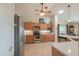 Well-equipped kitchen with stainless steel appliances and wood cabinets at 2389 E Fiesta Dr, Casa Grande, AZ 85194