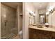 Bathroom with single vanity, shower, and toilet at 27440 N Alma School Pkwy # 116, Scottsdale, AZ 85262