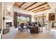 Spacious living room with fireplace and access to backyard patio at 27440 N Alma School Pkwy # 116, Scottsdale, AZ 85262