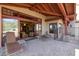 Relaxing patio with lounge chairs and access to the living room at 27440 N Alma School Pkwy # 116, Scottsdale, AZ 85262