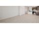 Open concept kitchen with dark wood cabinets and a breakfast bar at 25383 W Sunland Ave, Buckeye, AZ 85326