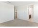 Spacious bedroom with an ensuite bathroom and walk-in closet at 25383 W Sunland Ave, Buckeye, AZ 85326