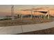 Community playground with play structures and shaded areas at 25383 W Sunland Ave, Buckeye, AZ 85326