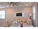 Living room with neutral colored couch and coastal decor at 3722 E Haflinger Rd, San Tan Valley, AZ 85140