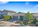 Single story home with gray exterior and landscaping at 10161 E Strobe Ave, Mesa, AZ 85212