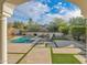 Resort-style pool and patio with mountain views at 18527 N 98Th Way, Scottsdale, AZ 85255