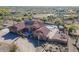 Aerial view showing a large home with a pool and expansive desert lot at 38820 N 19Th Way, Phoenix, AZ 85086
