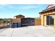 Back patio with gate, storage shed, and desert landscaping at 38820 N 19Th Way, Phoenix, AZ 85086