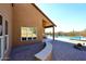 Backyard patio with a pool, desert landscaping, and mountain views at 38820 N 19Th Way, Phoenix, AZ 85086