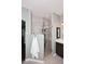 Modern bathroom featuring a glass-enclosed shower and tiled walls at 38820 N 19Th Way, Phoenix, AZ 85086