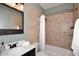 Bathroom with tiled shower, single vanity, and modern fixtures at 38820 N 19Th Way, Phoenix, AZ 85086