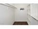 Walk-in closet offering ample storage space with built-in shelving at 38820 N 19Th Way, Phoenix, AZ 85086