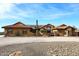 Front view of a home with a tile roof, stucco exterior, and desert landscaping at 38820 N 19Th Way, Phoenix, AZ 85086