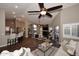 Open-concept living area with vaulted ceilings and backyard views at 38820 N 19Th Way, Phoenix, AZ 85086