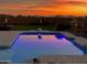 Inviting pool with colorful lights at sunset at 38820 N 19Th Way, Phoenix, AZ 85086
