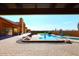 Covered patio with a pool, spa, and desert landscaping at 38820 N 19Th Way, Phoenix, AZ 85086