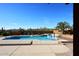 Inviting pool with a spa, surrounded by desert plants and a gated wall at 38820 N 19Th Way, Phoenix, AZ 85086