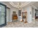 Elegant entryway with decorative chandelier and hardwood floors at 20227 N 264Th Ave, Buckeye, AZ 85396