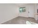 Simple dining area with tile floor and access to kitchen at 3411 N 12Th Pl # 9, Phoenix, AZ 85014